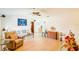 Inviting living room with vaulted ceilings and hardwood floors at 2729 Hilda Ct, Orlando, FL 32826
