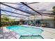 Enjoy the outdoors with this home's screened-in pool, spa, patio, and outdoor furniture at 2729 Hilda Ct, Orlando, FL 32826