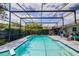 Sparkling screened-in pool and patio area, perfect for outdoor entertaining and relaxation at 2729 Hilda Ct, Orlando, FL 32826