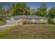 Charming single-story home with a well-manicured lawn and cozy, inviting curb appeal at 275 W 4Th St, Chuluota, FL 32766