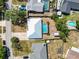 An aerial view of a neighborhood featuring a home with a pool, shed, and fire pit at 2990 Mallard Dr, Deltona, FL 32738