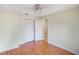 Simple bedroom with hardwood floors and a closet at 2990 Mallard Dr, Deltona, FL 32738