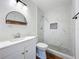 Updated bathroom featuring new fixtures, custom tile in shower, and new vanity offering style and functionality at 3019 Page Ave, Orlando, FL 32806