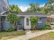Charming single-story home with a well-maintained front yard and concrete walkway leading to the front door at 3019 Page Ave, Orlando, FL 32806