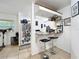 Bright kitchen featuring a breakfast bar with seating and stainless steel appliances at 3019 Page Ave, Orlando, FL 32806