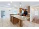 Spacious kitchen with a large island perfect for food preparation and entertaining at 3019 Page Ave, Orlando, FL 32806