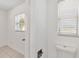 Clean bathroom featuring tile floors, a toilet, and a window for natural light at 315 Tulane Dr, Altamonte Springs, FL 32714