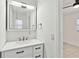 Bright bathroom features a vanity with modern fixtures and a mirrored medicine cabinet at 315 Tulane Dr, Altamonte Springs, FL 32714