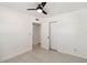 Bedroom features tile flooring, closet, white trim and ceiling fan at 315 Tulane Dr, Altamonte Springs, FL 32714
