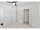 Bedroom features tile flooring, closet, white trim and ceiling fan at 315 Tulane Dr, Altamonte Springs, FL 32714