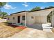 Well-maintained home featuring a carport, updated landscaping, and freshly painted exterior at 315 Tulane Dr, Altamonte Springs, FL 32714