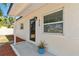 Inviting front porch featuring painted brick, house numbers, and decorative landscaping at 315 Tulane Dr, Altamonte Springs, FL 32714