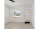 Bright living room with window, ceiling fan, tile flooring and fresh paint at 315 Tulane Dr, Altamonte Springs, FL 32714