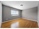 Neutral bedroom with hardwood floors and natural light at 346 Willet Ave, Apopka, FL 32703