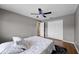Bedroom featuring ceiling fan, hardwood floors, a large closet and natural light at 346 Willet Ave, Apopka, FL 32703
