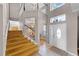 Bright foyer with hardwood stairs, high ceilings, transom windows and lots of natural light at 346 Willet Ave, Apopka, FL 32703