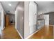 Bright hallway with hardwood floors leading to the loft at 346 Willet Ave, Apopka, FL 32703