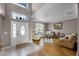 Inviting living room with high ceilings, comfortable seating, and abundant natural light at 346 Willet Ave, Apopka, FL 32703