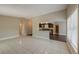 Large living room with tiled floors offering an open concept floorplan at 3718 Mitchell Rd, Orlando, FL 32808