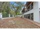 Backyard view showing brick pavers and a glimpse of the rear of the white home at 409 San Sebastian Prado, Altamonte Springs, FL 32714