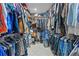 Walk-in closet with custom shelving and ample hanging space for clothes at 409 San Sebastian Prado, Altamonte Springs, FL 32714