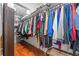 Walk-in closet with ample hanging storage and wood floors at 409 San Sebastian Prado, Altamonte Springs, FL 32714