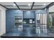 Modern kitchen with blue cabinets, stainless steel appliances and large island with countertop cooking surface at 409 San Sebastian Prado, Altamonte Springs, FL 32714