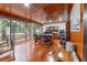 Bright home office space with hardwood floors, wood accents, and large windows at 409 San Sebastian Prado, Altamonte Springs, FL 32714
