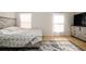 Comfortable bedroom with tiled flooring, ceiling fan, natural light and neutral wall color at 443 S Observatory Dr, Orlando, FL 32835