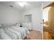 Bright bedroom featuring tiled flooring, ceiling fan, natural light, and neutral wall color at 443 S Observatory Dr, Orlando, FL 32835