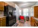 Bright eat-in kitchen offering great natural light and storage at 443 S Observatory Dr, Orlando, FL 32835