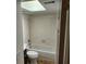 Compact bathroom featuring a tiled shower/tub combination and modern fixtures at 500 Newell Hill Rd # 109A, Leesburg, FL 34748