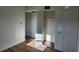 Bedroom with laminate flooring and large closet for ample storage space at 500 Newell Hill Rd # 109A, Leesburg, FL 34748