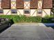 Exterior of property showcasing Tudor-style architecture and landscaping at 500 Newell Hill Rd # 109A, Leesburg, FL 34748