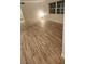 Bright room with laminate flooring at 500 Newell Hill Rd # 109A, Leesburg, FL 34748