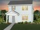 Charming two-story home with light blue exterior and well-manicured landscaping with tropical trees at 5032 Starling Bird Ln, St Cloud, FL 34771