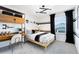 Stylish bedroom featuring modern decor, a study area, and plenty of natural light at 5044 Starling Bird Ln, St Cloud, FL 34771