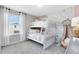 ' bedroom with a white bunk bed, whimsical wallpaper, and plenty of space to play at 5044 Starling Bird Ln, St Cloud, FL 34771