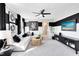 Stylish living room with modern decor, white sofa, television, and plenty of space for entertaining guests at 5044 Starling Bird Ln, St Cloud, FL 34771