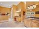 Spacious bathroom with dual vanities, granite countertops, and a unique chandelier at 5100 Cranes Point Ct, Orlando, FL 32839