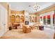 Main bedroom with built-in bookshelves, fireplace, and access to the backyard at 5100 Cranes Point Ct, Orlando, FL 32839