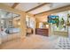 Comfortable main bedroom featuring wood beams, mirrored closet, and natural light at 5100 Cranes Point Ct, Orlando, FL 32839