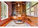 Elegant home office featuring rich wood details, custom bookshelves, and a unique desk at 5100 Cranes Point Ct, Orlando, FL 32839