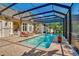 Inviting screened-in pool with lounge chairs and patio, perfect for outdoor entertaining at 5100 Cranes Point Ct, Orlando, FL 32839