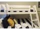 Charming bunk bedroom with comfortable striped bedding and natural light at 5123 Crown Haven Dr, Kissimmee, FL 34746