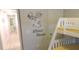 ' bedroom featuring fun Mickey Mouse decals and a white bunk bed frame at 5123 Crown Haven Dr, Kissimmee, FL 34746