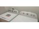 Functional laundry area equipped with a modern washing machine and dryer at 5123 Crown Haven Dr, Kissimmee, FL 34746
