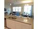 Open concept living and dining area with large windows at 5123 Crown Haven Dr, Kissimmee, FL 34746