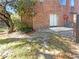 Private backyard area featuring a patio and some trees at 5126 Picadilly Circus Ct # 11, Orlando, FL 32839