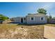 Exterior image of home with spacious backyard at 5600 Arundel Dr, Orlando, FL 32808